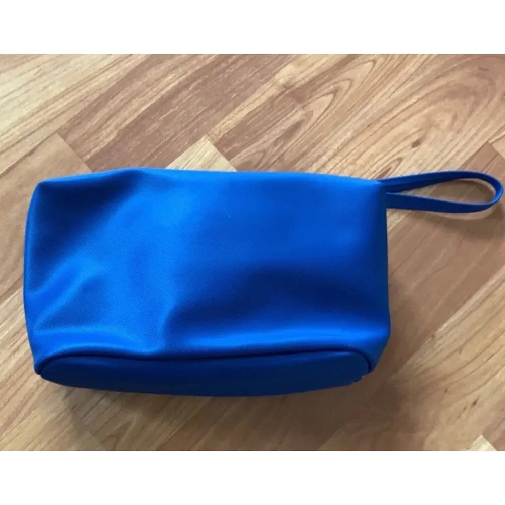 Tomas‎ Olivos Travel Pouch